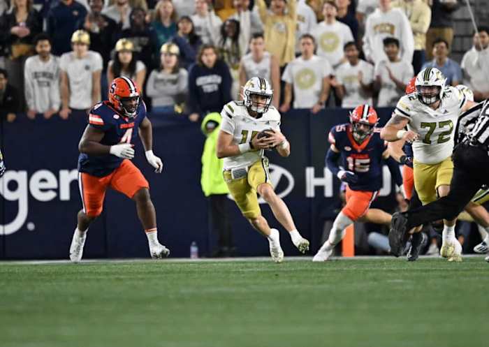 Weston Franklin (#72) hustles after making a big block for QB Haynes King against Syracuse